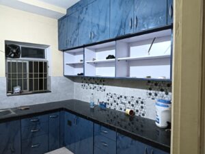 blue-modular-kitchen-cabinets-hexagonal-tiles