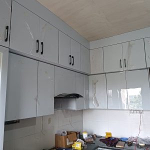 kitchen-upper-cabinets-light-blue-film-protection